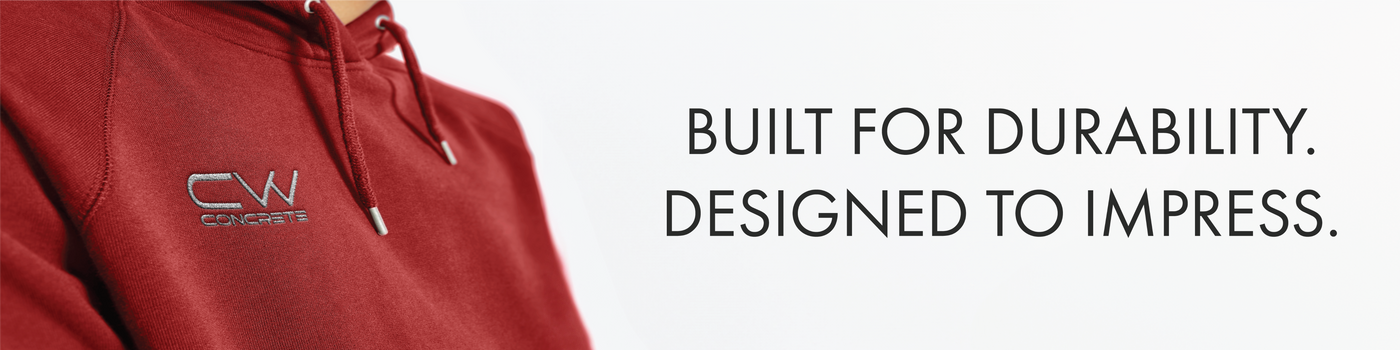 A close-up of a company logo embroidered on the right chest of a red hoodie, with overlay text that reads “Built for Durability, Designed to Impress,” highlighting CCS’s high-quality, long-lasting embroidery work.