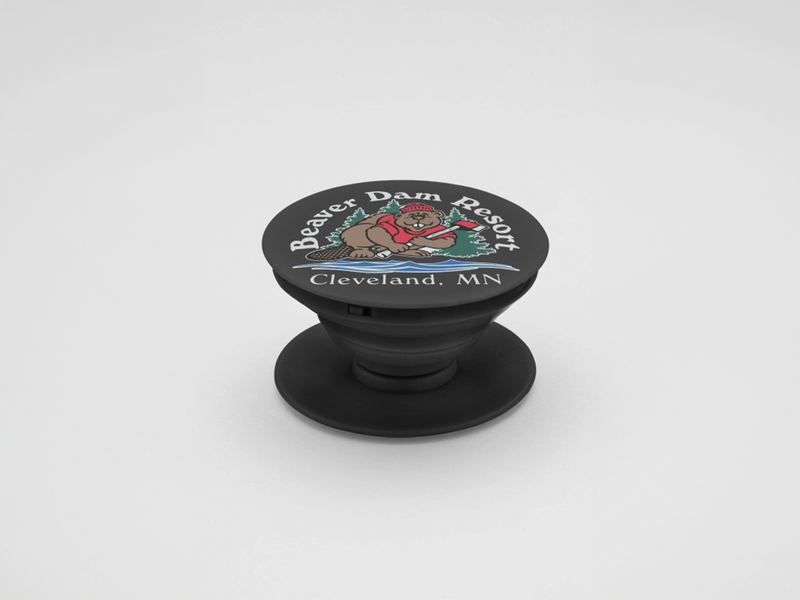 Phone grip (PopSocket) with company branding, adhered to the back of a smartphone for improved handling and hands-free use